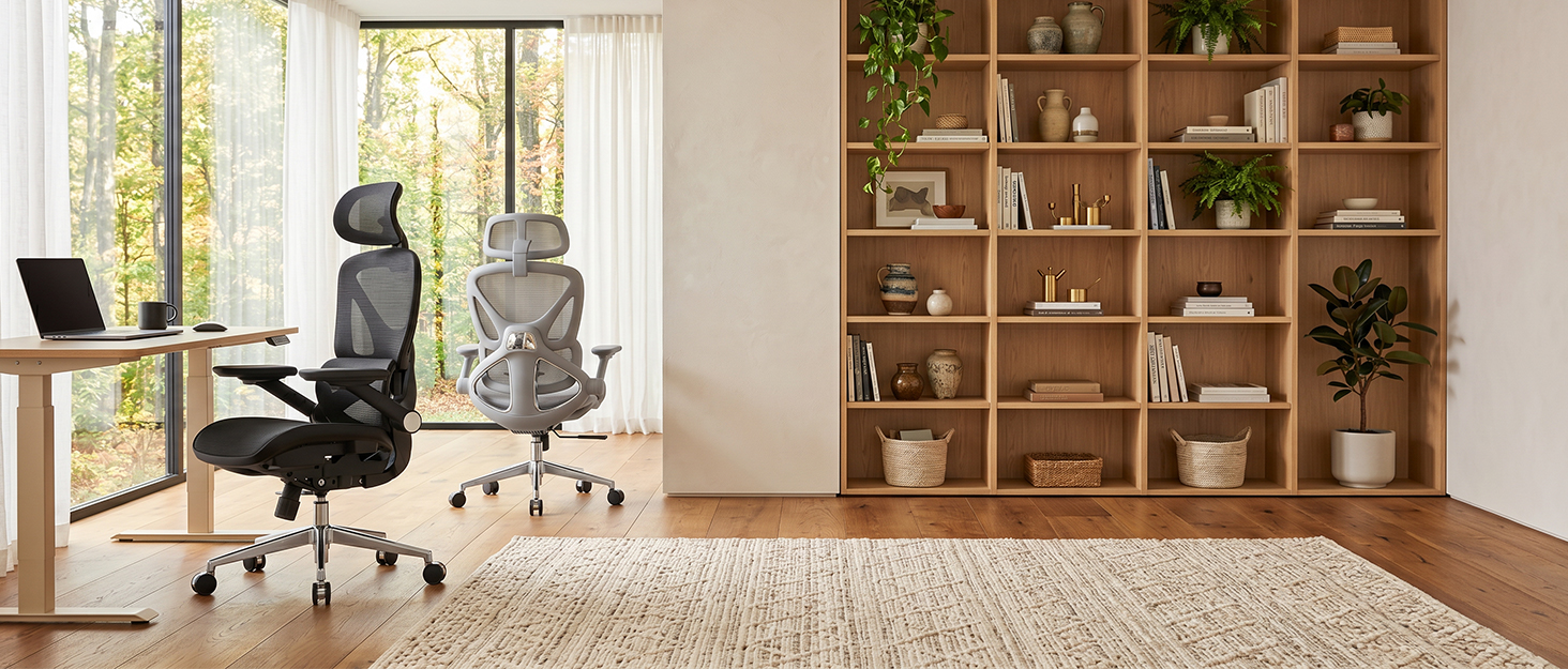 Black and gray CAPOT ergonomic office chairs in a modern workspace
